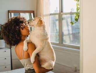 Woman holding dog